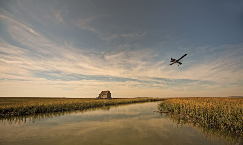 creek, fields, housee & sky