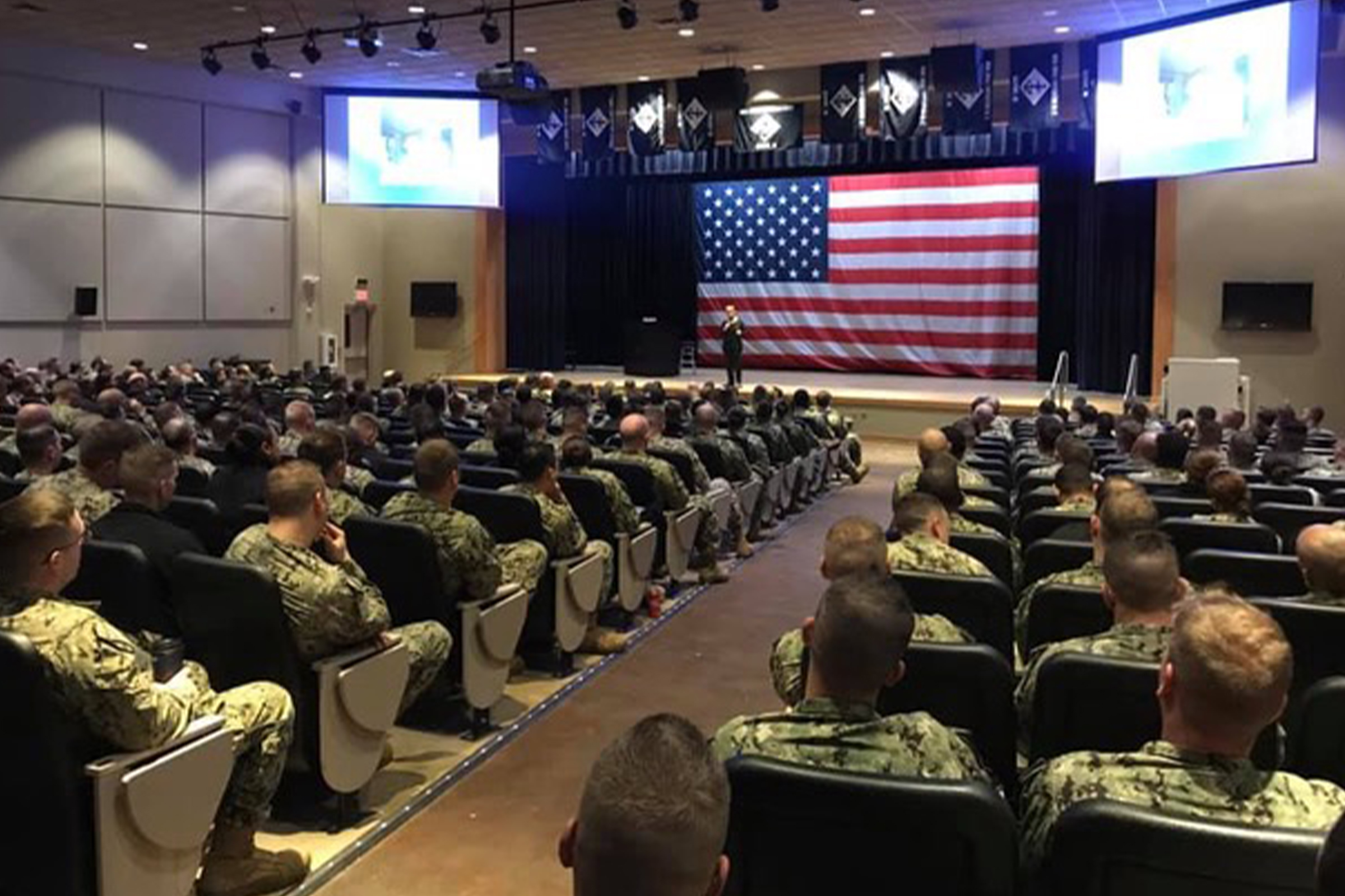 Janine speaking at military base