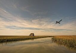 creek, fields, housee & sky